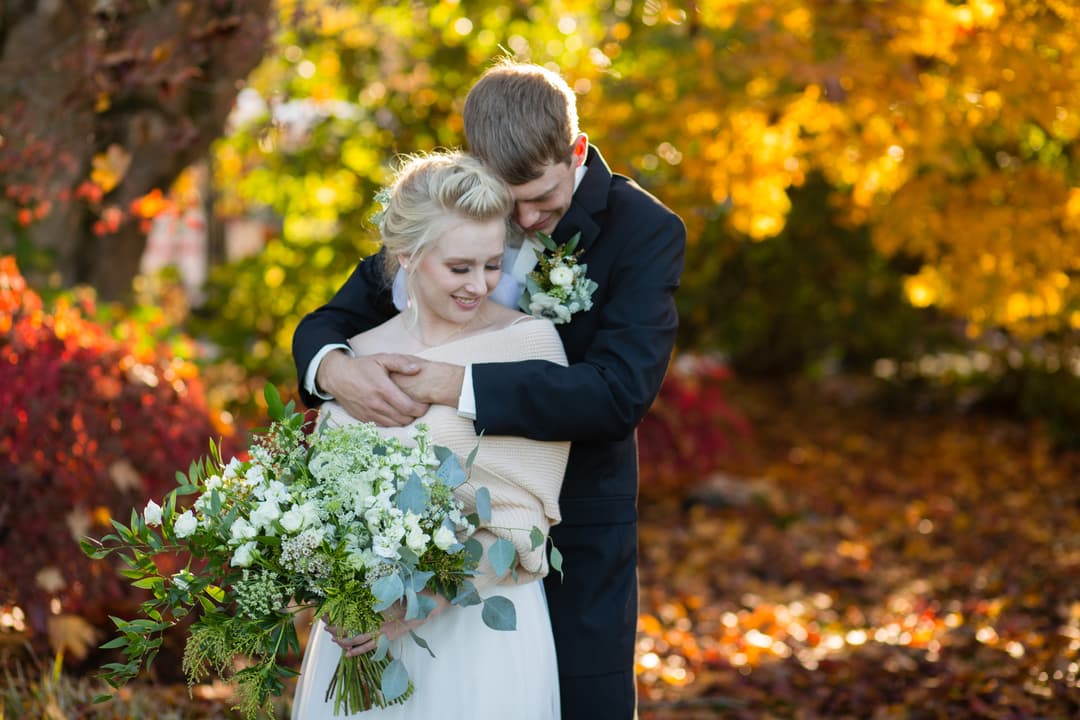 a groom holding a bride
